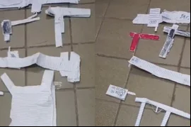 Crianças fazem armas de papelão com símbolo de facção